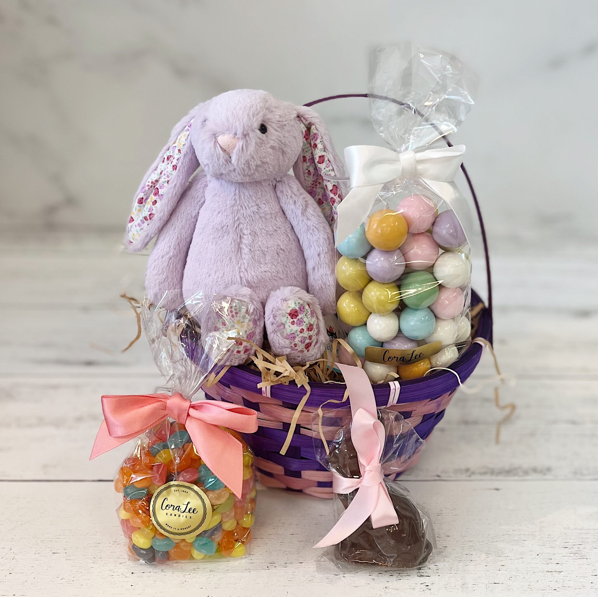 easter basket with stuffed bunny jelly beans chocolate bunny